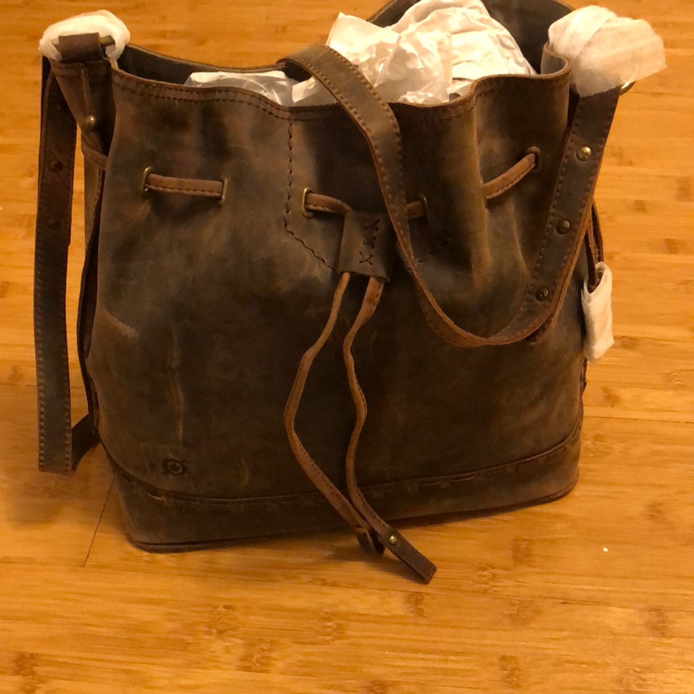 Distressed leather bag by born medium sized